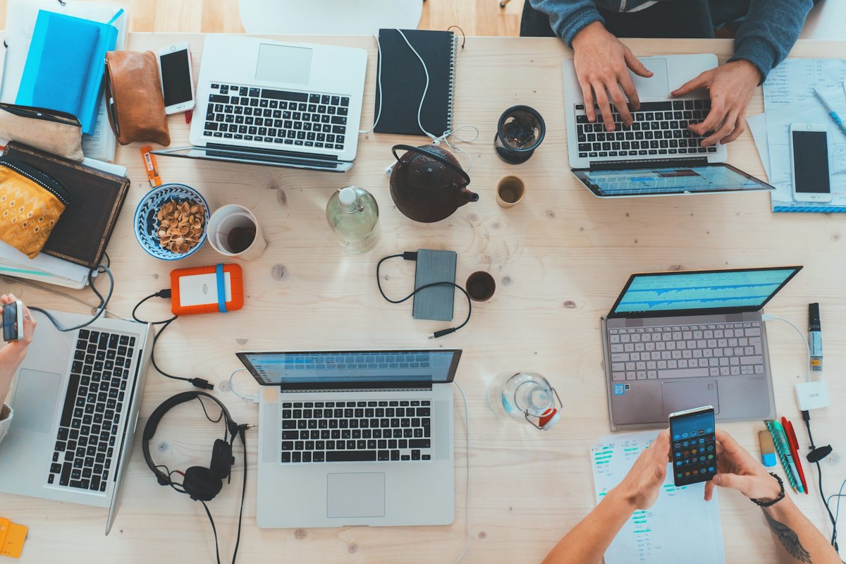 Digital marketing agency team collaborating in a bright modern office reviewing client online growth strategies