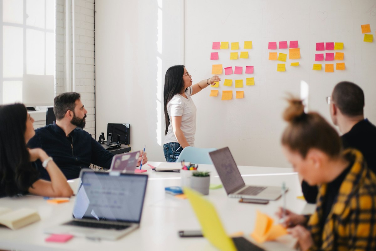 Business executives reviewing agency marketing contracts, performance deliverables, and transparent pricing terms