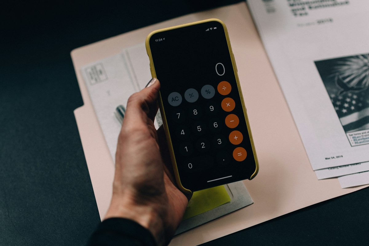 MyGreenBucks Net Jones platform investigation showing personal finance workstation with budget spreadsheets, calculator, and website credibility analysis