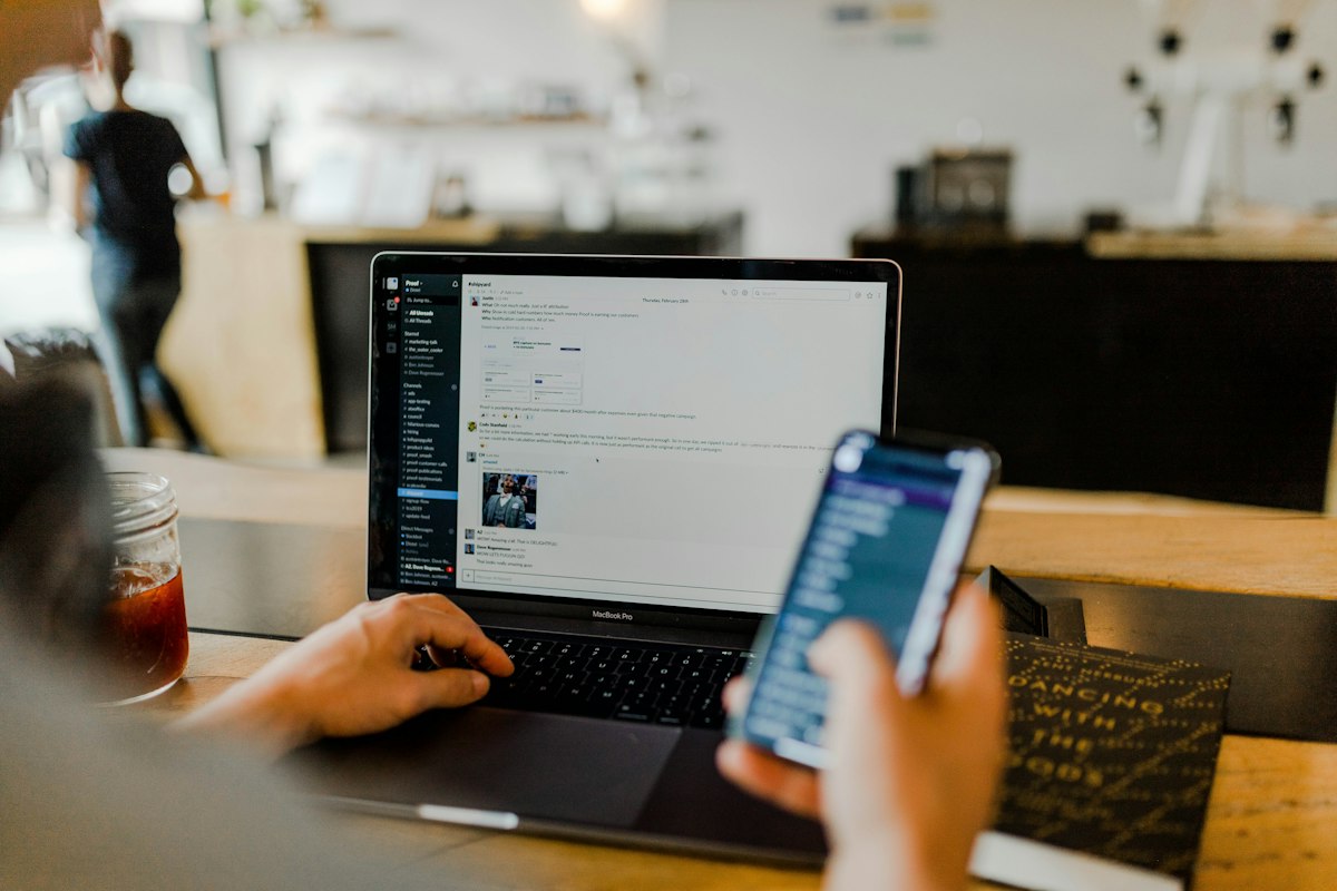 Business executive reviewing cybersecurity protocols, data privacy policies, and software subscription terms on a digital tablet
